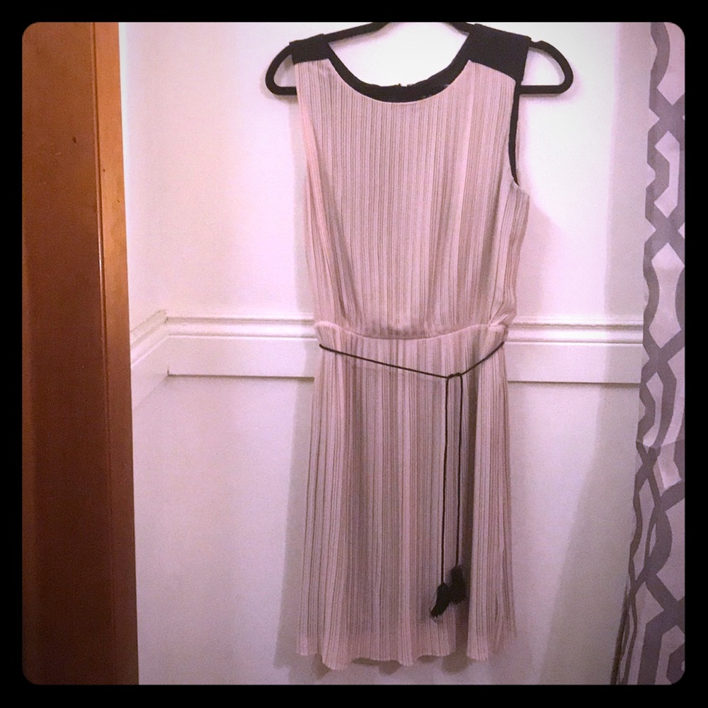 Nude and black dress.